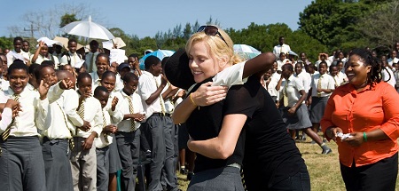 Charlize with her CTAOP team supporing African kids